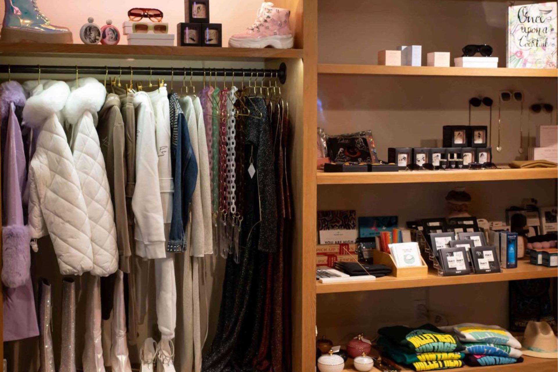 Closet filled with fashionable clothes, shoes and accessories