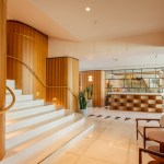 Hotel lobby with white marble grand staircase