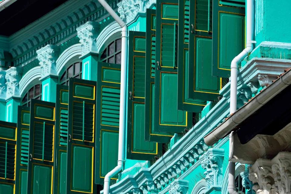 Colorful teal, green and yellow shutters in Singapore