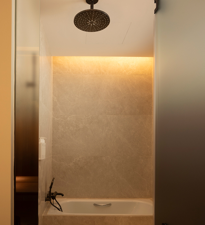 Bathtub with a showerhead