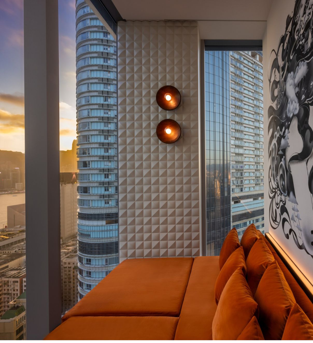 Image of an orange couch overlooking Hong Kong at Avoca