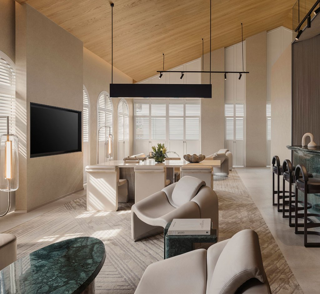 A modern living room with a sleek bar area and stylish chairs.