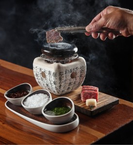 Mini robot grill for steak at Morimoto Doha