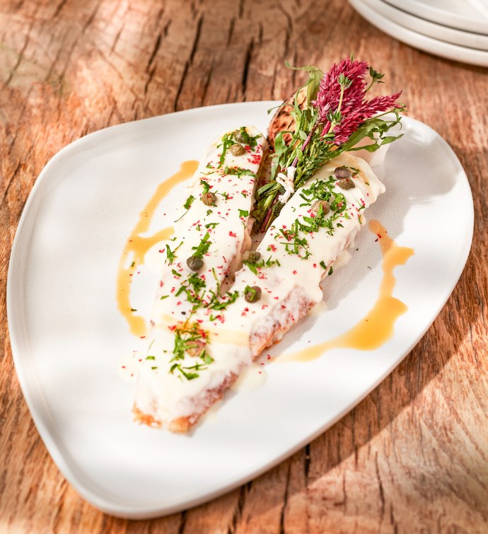 Dover sole white fish with green garnishes