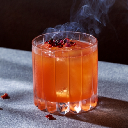 An orange smoking cocktail at Slate