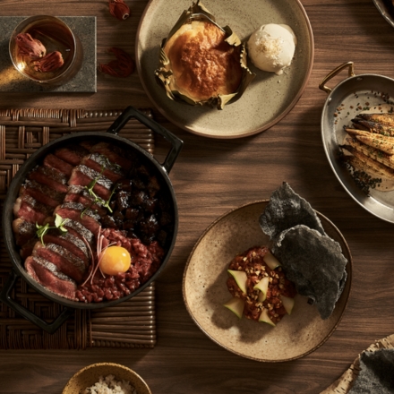 A table full of entrees and appetizers