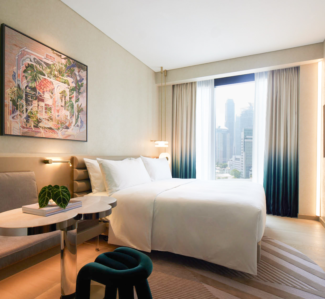 brightly lit room overlooking the city view