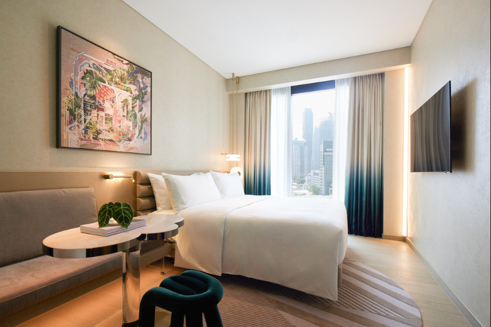 brightly lit room overlooking the city view