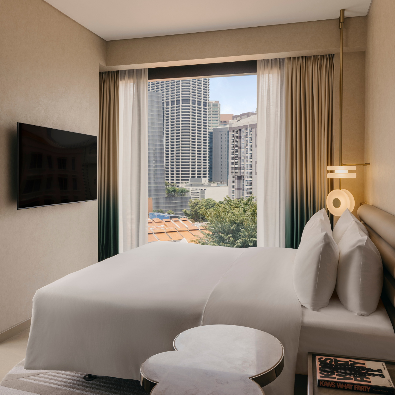 room overlooking a view of low rise shophouses