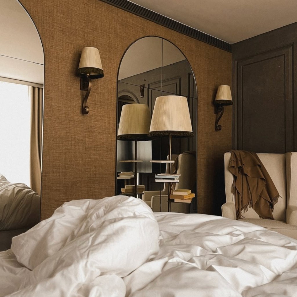 White tousled covers on bed