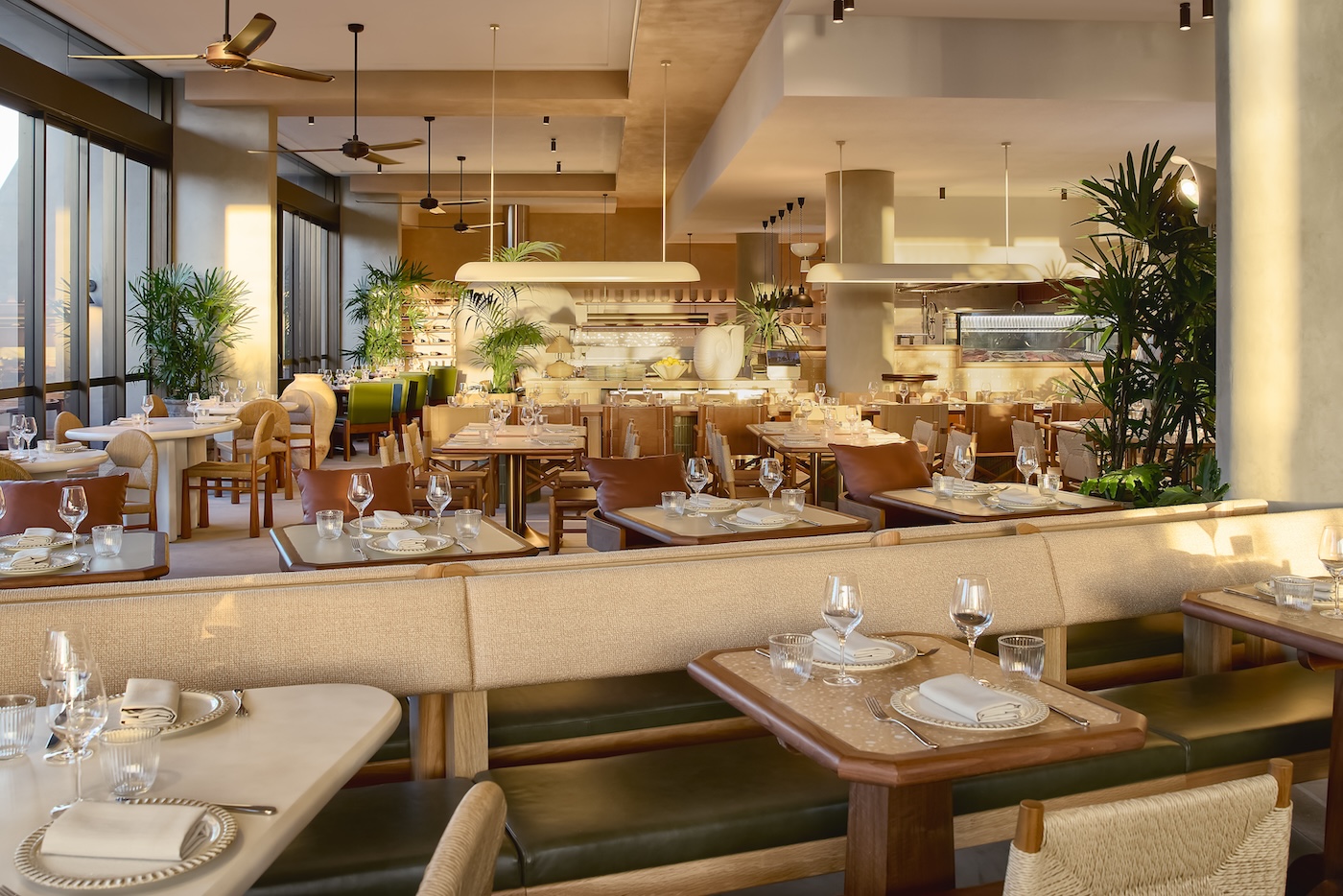 Large, airy restaurant dining room with tables and chairs