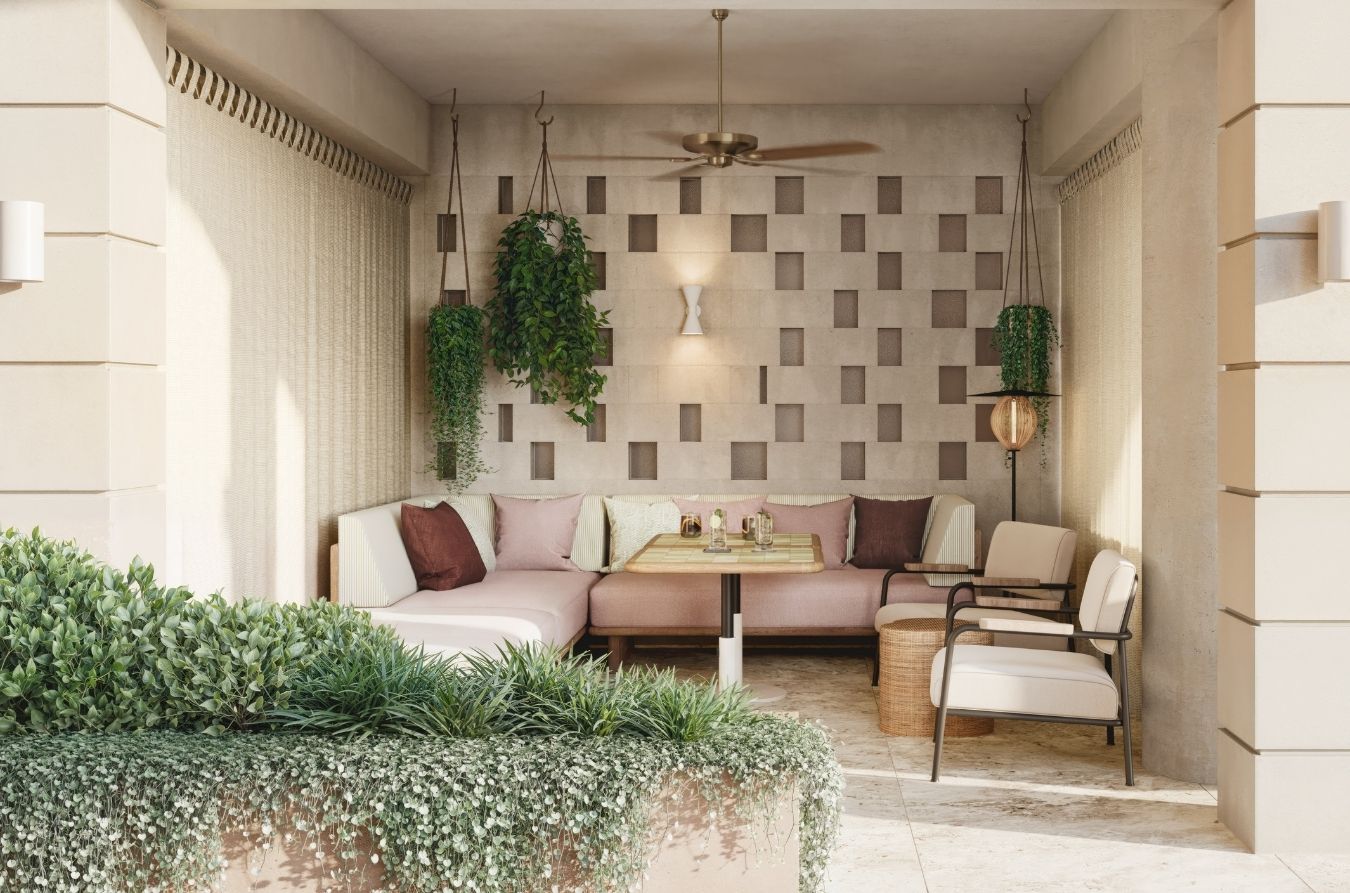 Poolside cabanas with greenery decorating the space