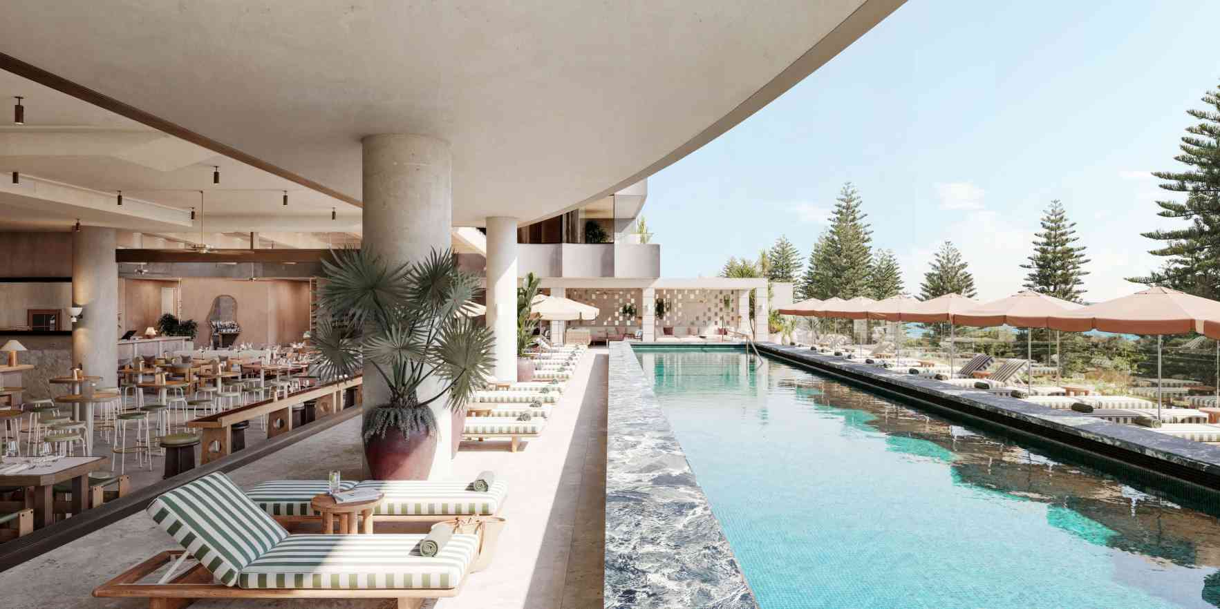 Pool club with large rectangular pool and striped chaise lounges on one side, and cabanas on the other