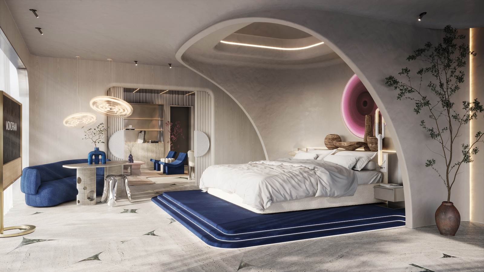 Large suite with white bed and blue headboard in a curved enclosure