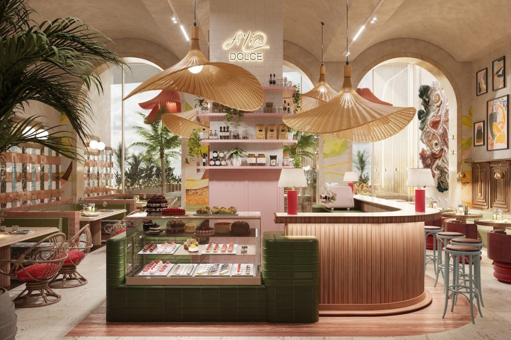 Colorful restaurant with fan-like lights and pastry case