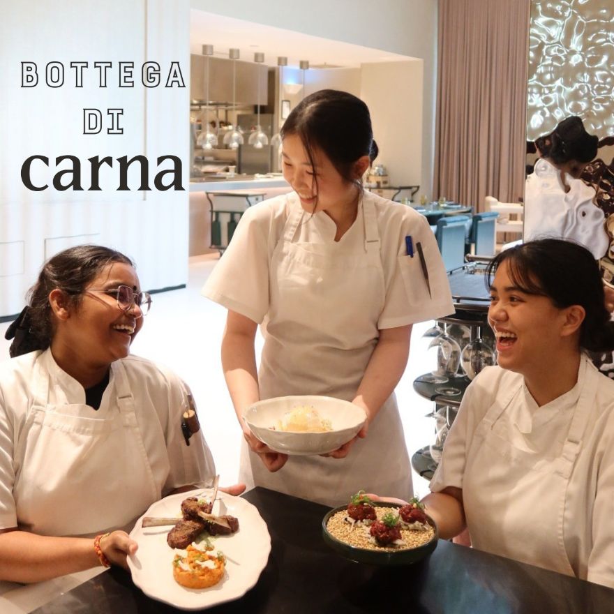 female chefs gathered at a table in bottega di carna mondrian singapore International Women's day