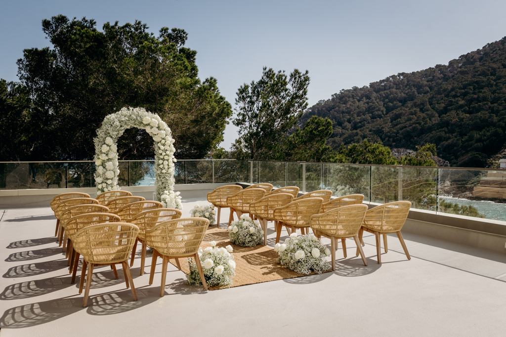 Mondrian Ibiza outdoor terrace with sea view and wedding setting with white flowers
