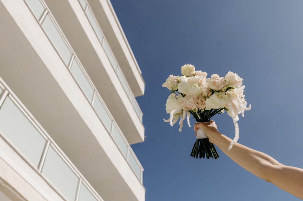 Mondrian Ibiza outdoor terrace with sea view and wedding setting with white flowers
