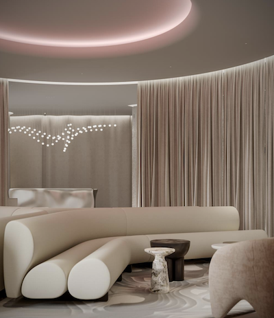 Cream modern sofa, cream modern lounge chair, and cream curtains behind it
