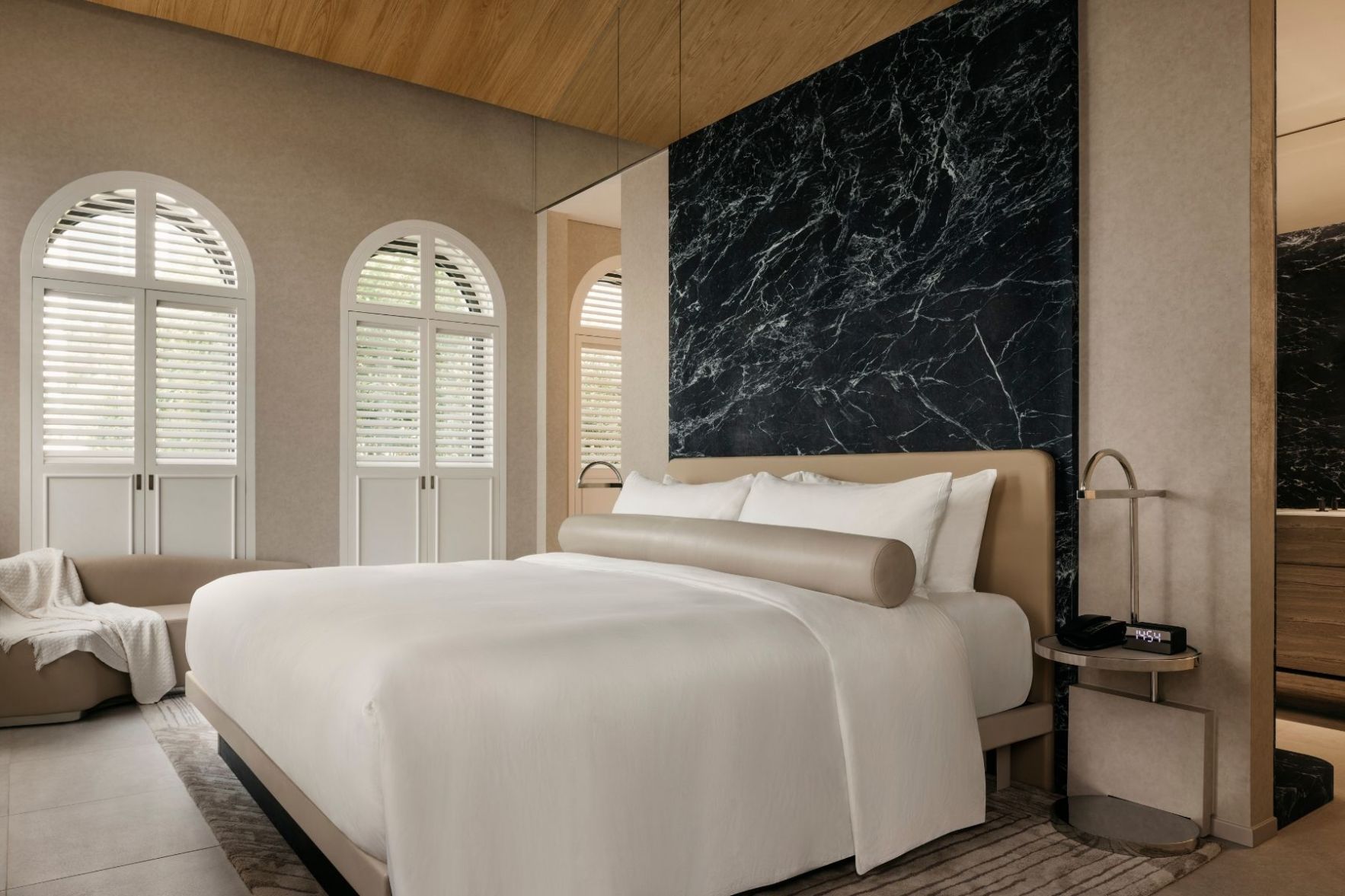 Large white bed in hotel room