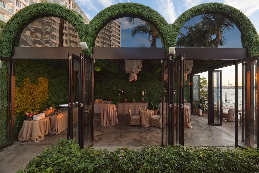 Greenhouse structure with banquet tables and seating