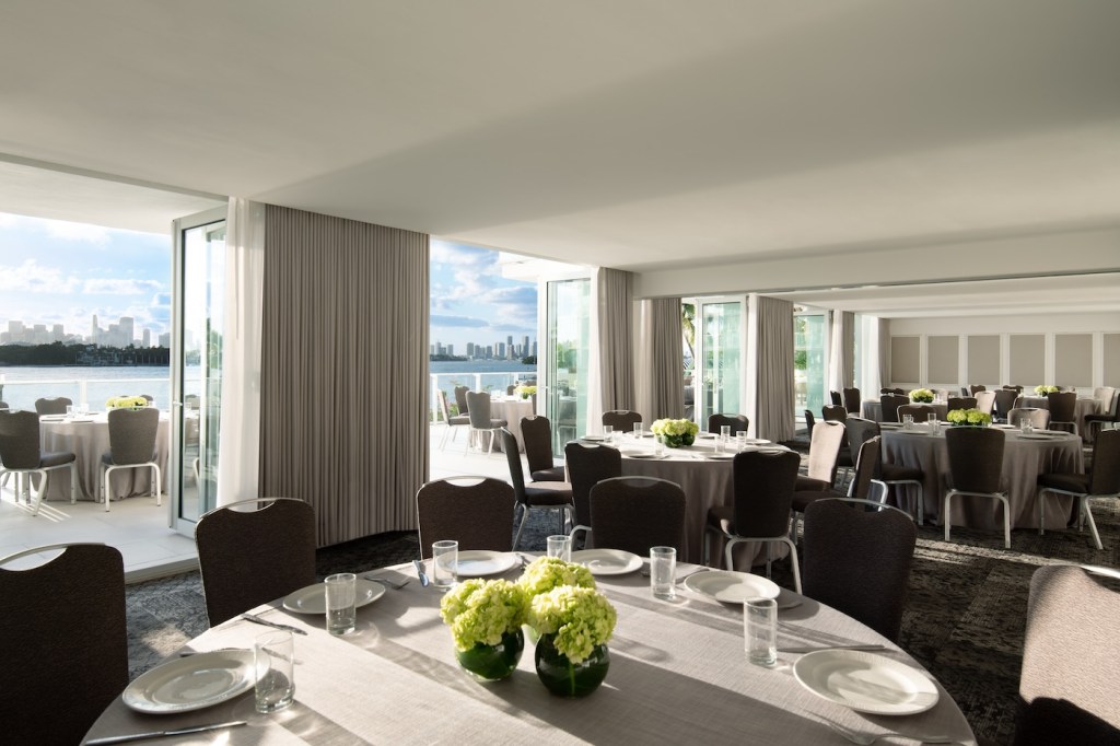 Banquet room with white round tables