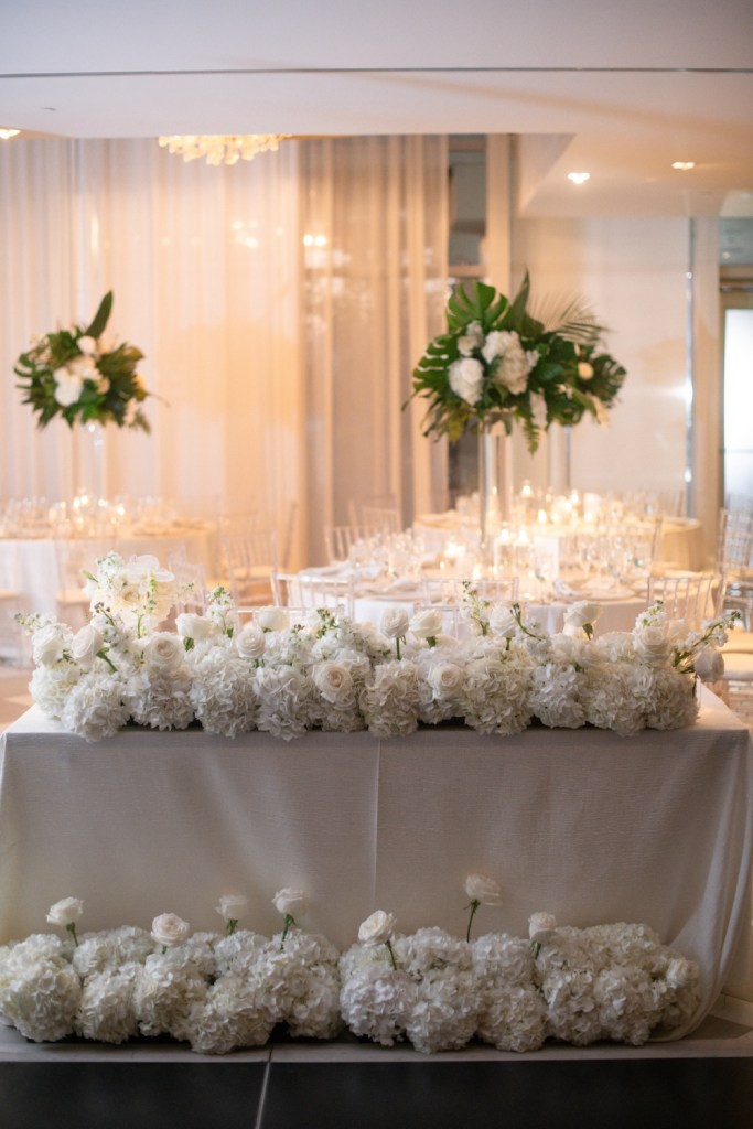 White bouquets sitting on a table