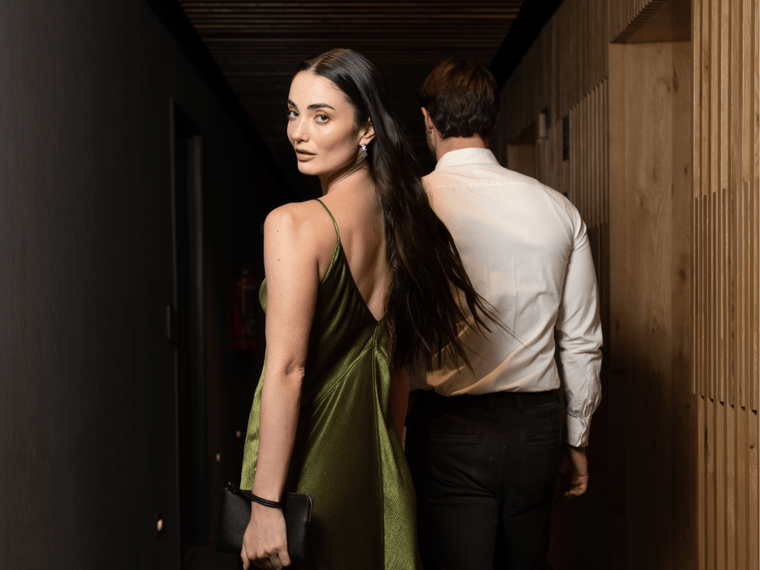 A stylish couple walking through the contemporary interiors of Mondrian Mexico City Condesa, a luxury lifestyle hotel in Mexico City. Copy